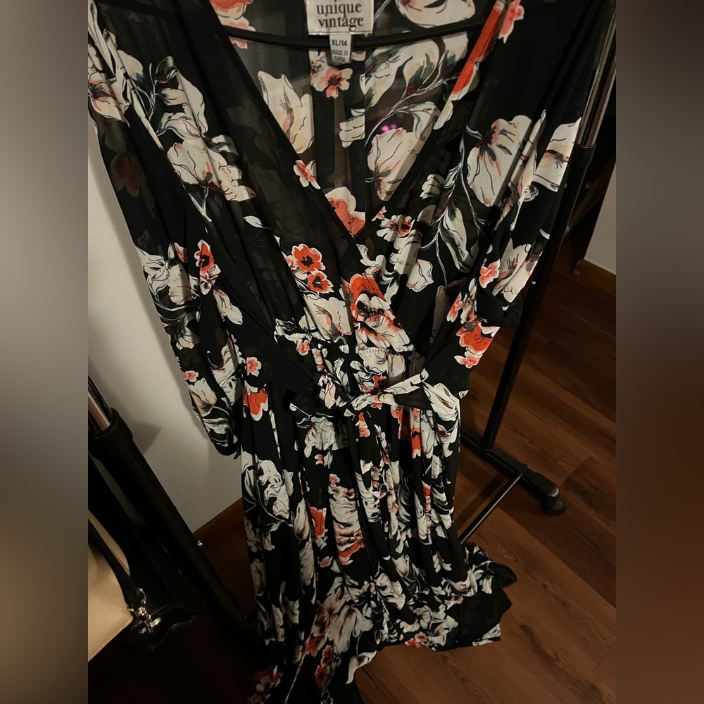 Floral black maxi dress. Sheer top. Lined bottom